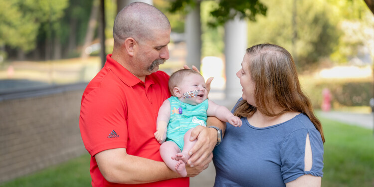 Davis and Shanna Hodges hold their son, Eli, after a clinic visit in Durham, NC.