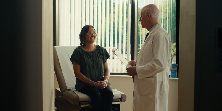 Raquel sits in the office with Dr. Berchuck